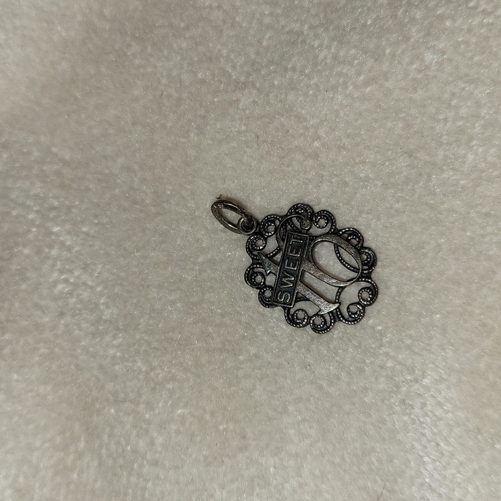 Vintage sterling silver Sweet 16 pendant